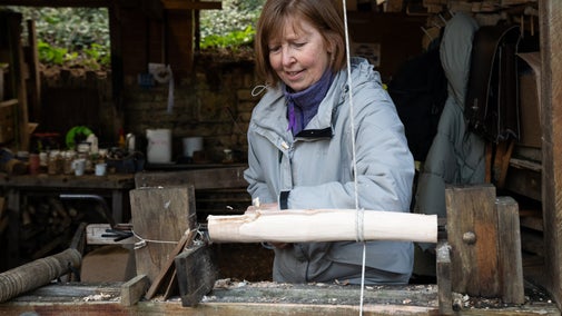 A women using a pole lathe on a course with the Somerset Bodgers